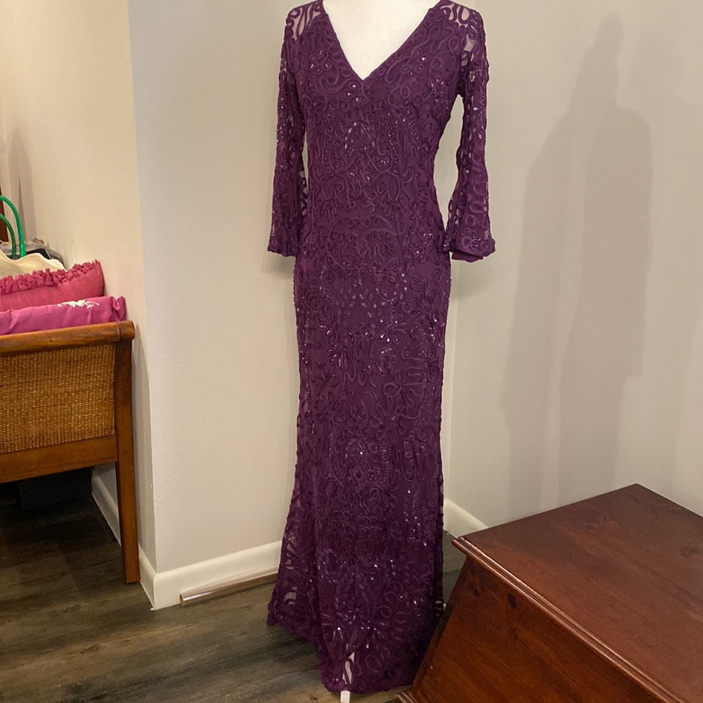 JS Collections sequin beaded bell sleeve mermaid gown.